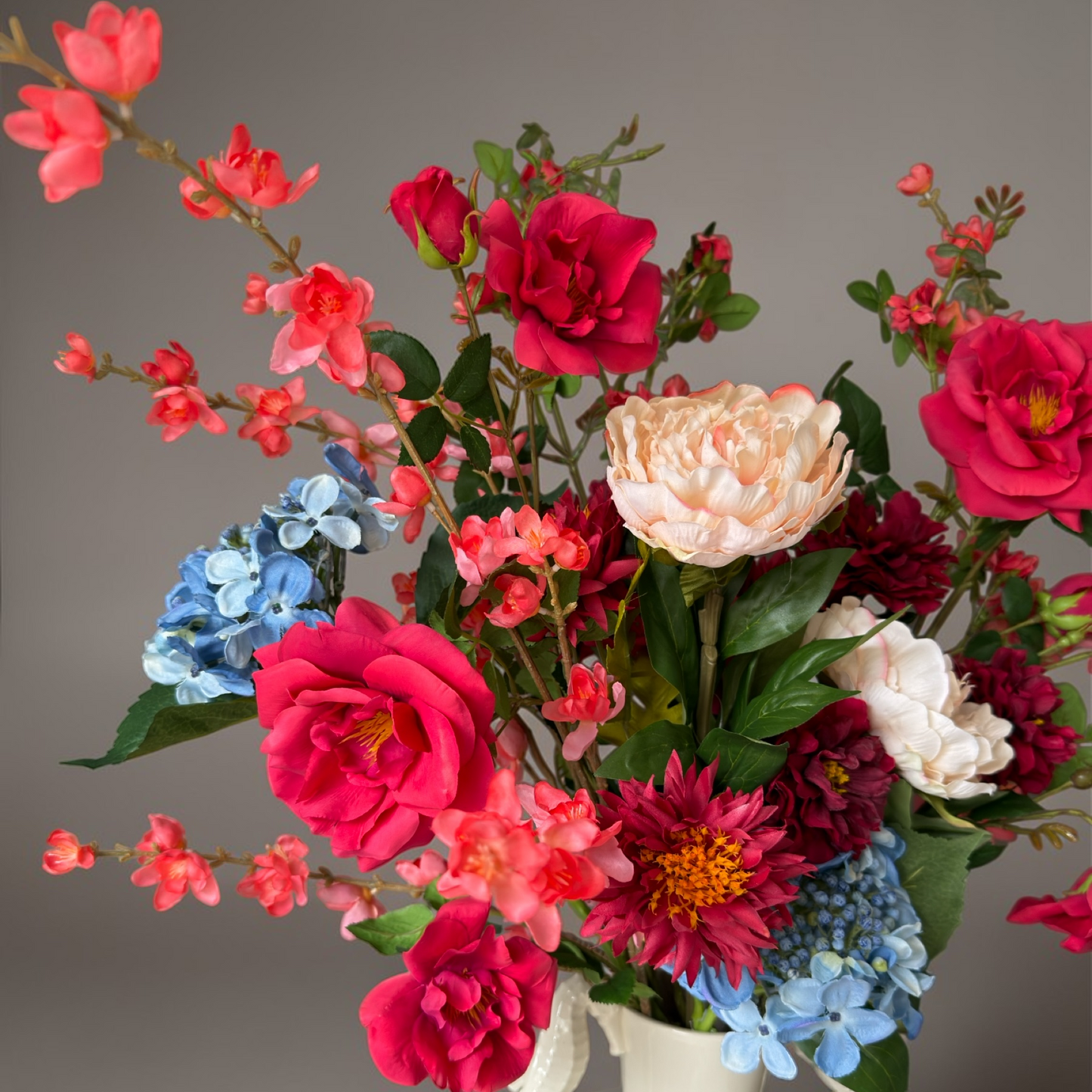 Luxury Coral Garden Bouquet with silk roses, hydrangeas and garden-style blooms arranged in a white vase for timeless home decor