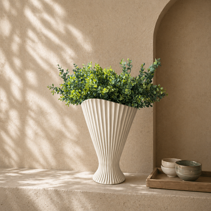 Fresh Greenery Bouquet, a luxury silk boxwood bouquet with realistic green stems styled in a white fluted vase on a stone table in warm natural light