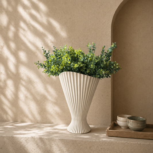 Fresh Greenery Bouquet, a luxury silk boxwood bouquet with realistic green stems styled in a white fluted vase on a stone table in warm natural light