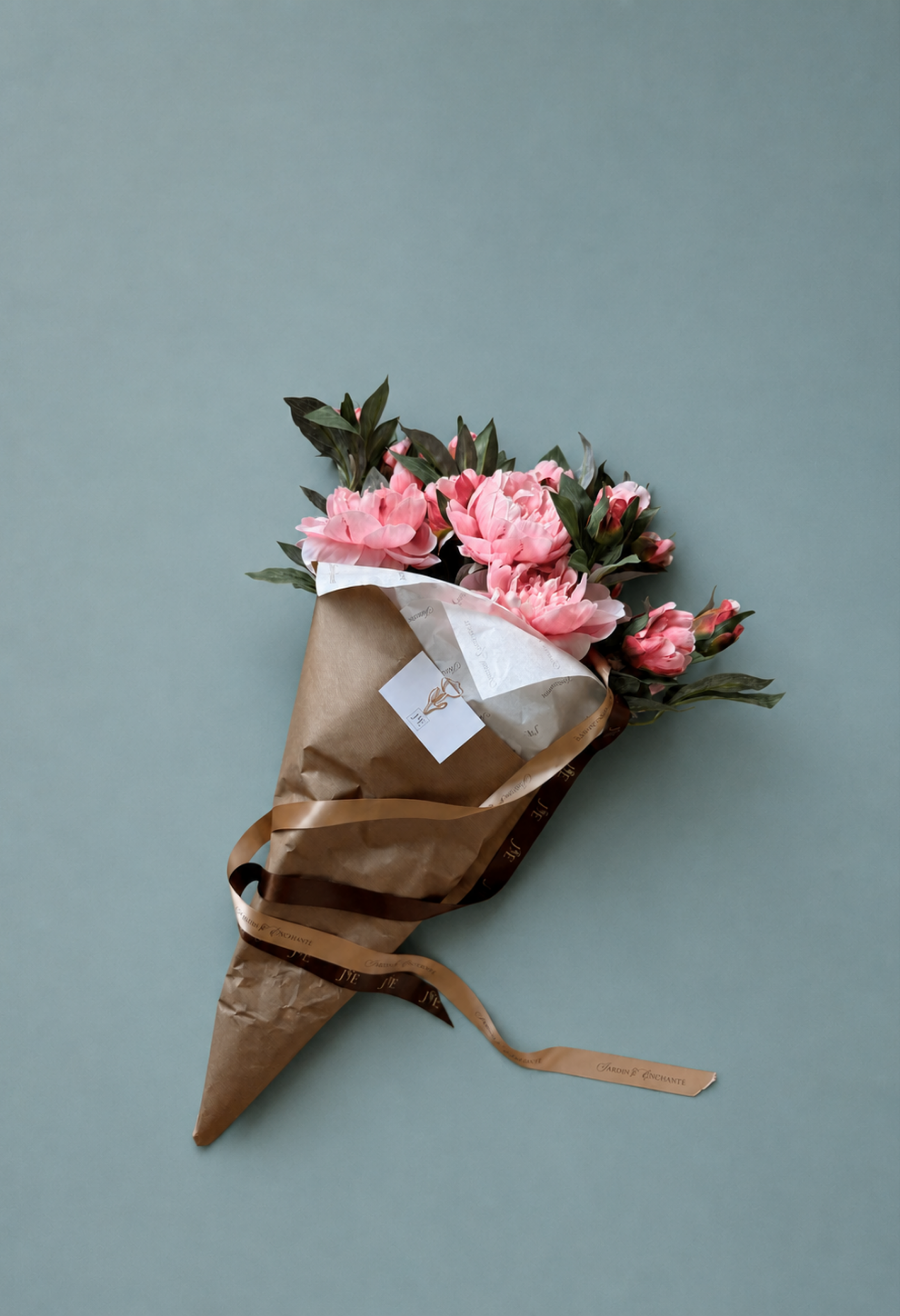 Luxury faux peony bouquet with realistic pink artificial flowers wrapped in kraft paper for elegant home decor, wedding flowers, gift bouquet, silk floral arrangement, and modern interior styling