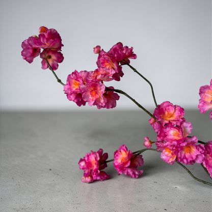 Pink Blossom Bouquet with high-quality silk pink blossoms, garden roses and ranunculus styled in a white fluted vase for elegant home decor
