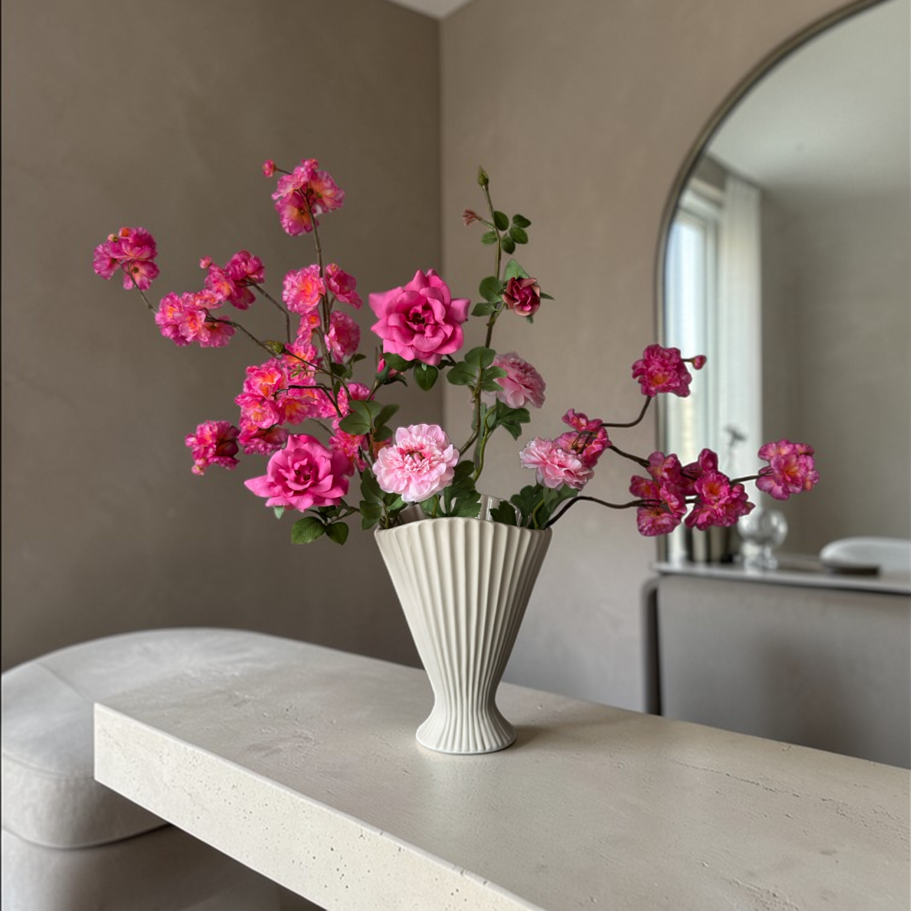 Pink Blossom Bouquet with high-quality silk pink blossoms, garden roses and ranunculus styled in a white fluted vase for elegant home decor