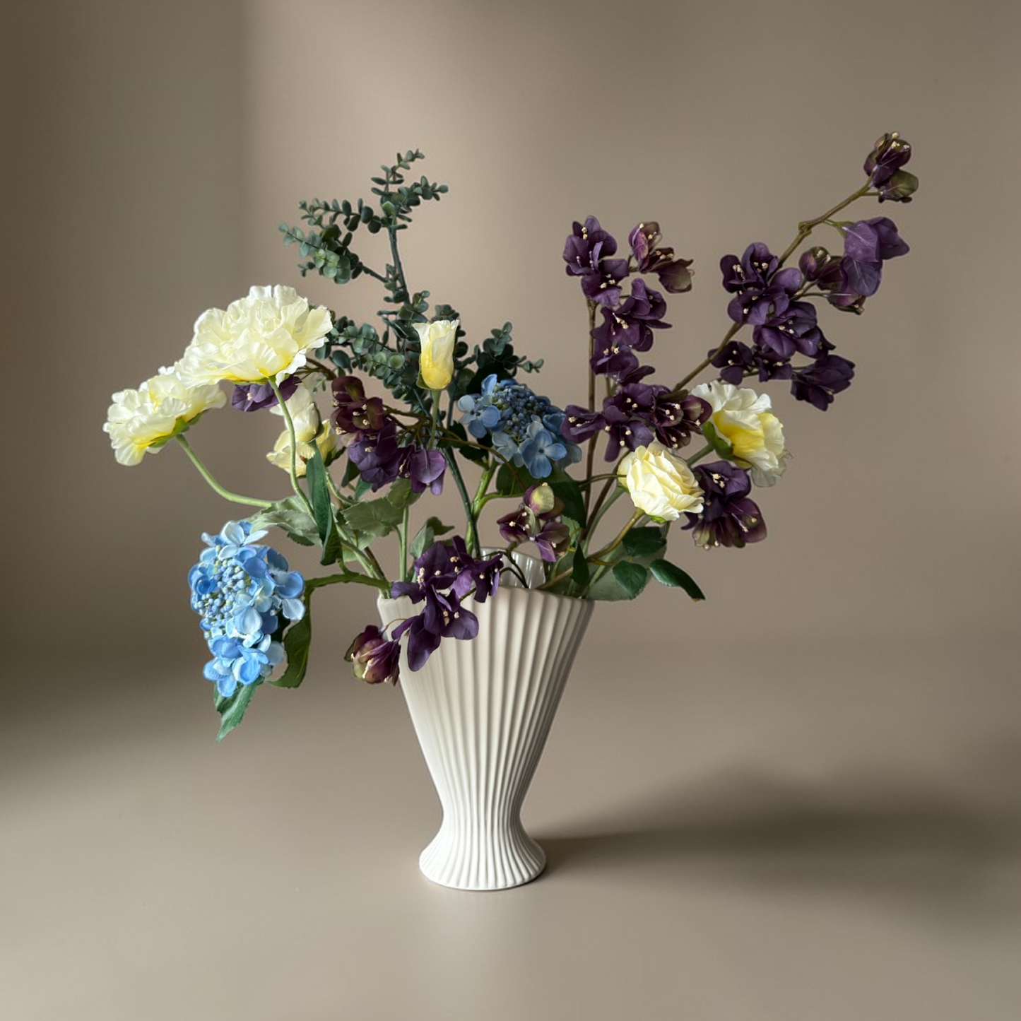 Plum Garden Bouquet with high-quality silk flowers in deep plum, soft yellow and blue tones arranged in a white vase for elegant home decor and interior styling.