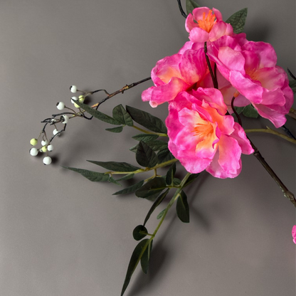 Wild Blossom Bouquet with high-quality silk pink blossoms and natural branches arranged in a tall black vase for elegant home decor and interior styling.